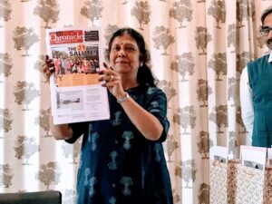 A parent showing off the newspaper
