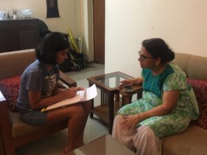 A student interviewing a resident